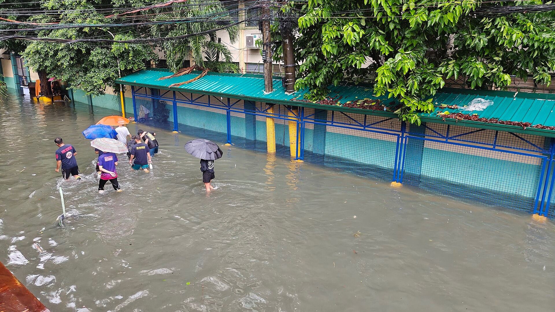 Philippine Flooding Kills Eight as Monsoon Rains Displace 110,000 Families