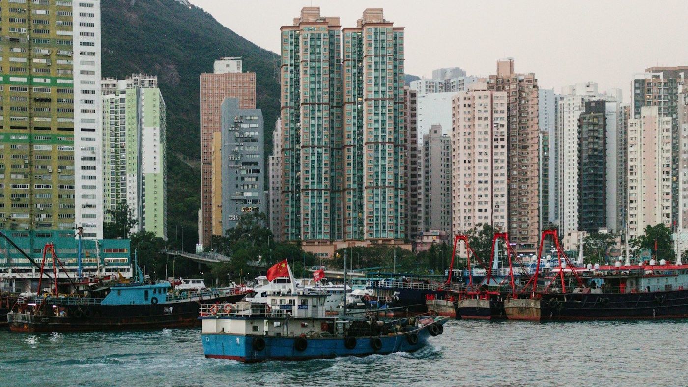 Hong Kong leader apologizes for deadly Tai Po fire as housing chief resigns
